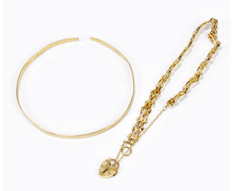 A 9ct yellow gold gatelink bracelet with padlock clasp and a yellow metal bangle stamped 9ct, approx 9g.Additional Informatio