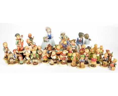 GOEBEL; a collection of thirty-two Hummel figures including 'Accordion Boy', 'Meditation', 'Drummer Boy', etc, also a Lladro 