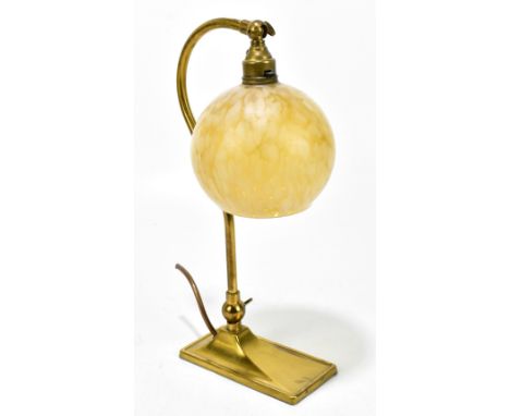 An Edwardian style brass table lamp, with associated mottled glass shade on a outswept rectangular base, height 34.5cm.Additi