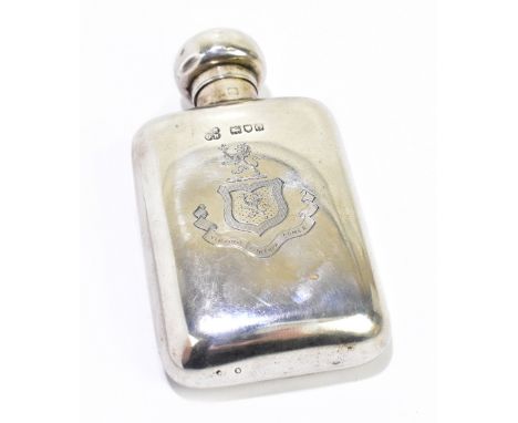 An Edwardian hallmarked silver hip flask of small proportions, the hinged swivel action cap above rounded rectangular body en