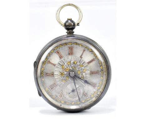 A hallmarked silver key wind open face pocket watch, the circular dial set with gilt Roman numerals outside filigree and engi