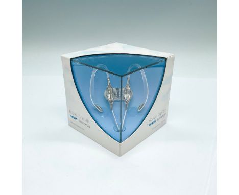 An unopened box of ear hook headphones by Philips with Swarovski crystals. This item has its original box: 3.75"L x 3.75"W x 