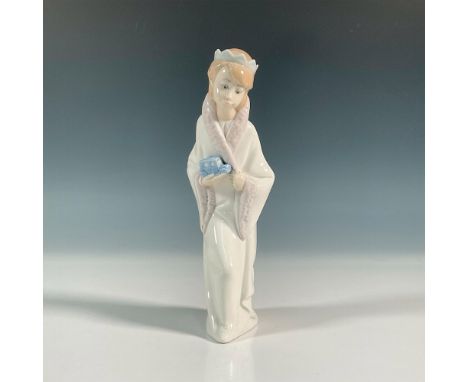 Glossy finish figure that is part of the Children's Nativity scene. Young king wearing crown, in mid kneel position holding a