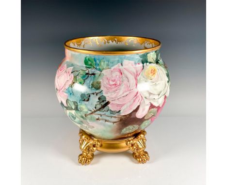 An exquisite jardiniere planter in white and pink thorny roses adorned with a thick gilded rim. This item has a base included