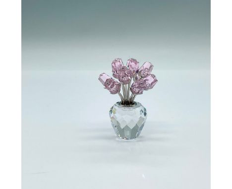 Part of the In The Secret Garden collection. Light pink crystal roses on rhodium stems. Resting on a clear crystal vase. Swar