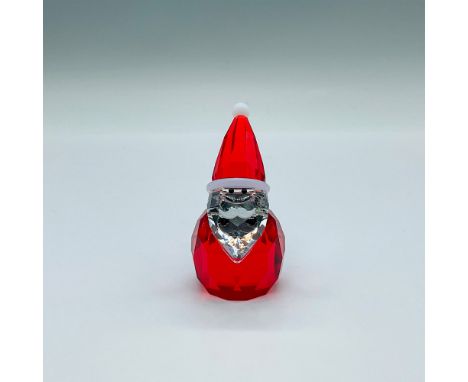 An adorable figure of jolly Kris Kringle in red and clear crystal with white lacquered moustache. Swarovski marked. This item