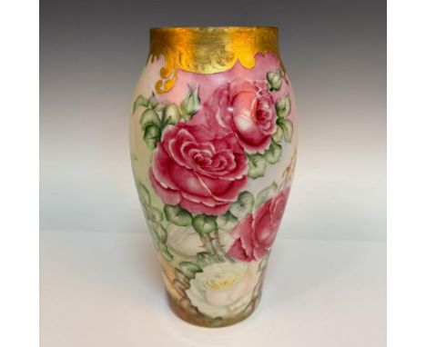 A beautiful vase with hand painted pink and white roses. Gilded decorated trim on the top. Tressemanes &amp; Vogt marked. Iss