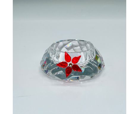 Part of the Christmas Home collection. A clear crystal candle holder decorated with facetted light Siam and topaz crystal to 