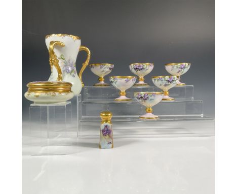 All pieces beautifully hand painted with violet flower design. Pieces included: 1 T&amp;V gilt handled vase, 1 gilt top shake