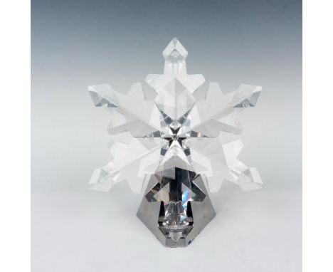 Exquisite limited edition lead crystal made with a mirrored stand; assembly required. This Christmas star is part of the Chri