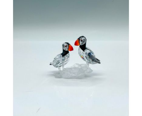 Part of the Feathered Beauties collection. Two puffins on a frosted rock base. The small birds are made from clear, jet cryst