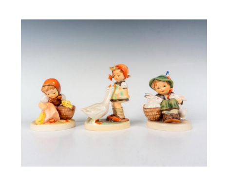 A collection of 3 delightful Hummel pieces. Chick Girl captures a sweet moment as a young girl tends to a cluster of adorable