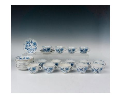Magnificent set of German porcelain cup and saucer sets decorated in the Blue Onion pattern, which was originally named Bulb 