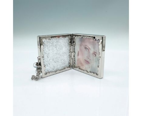 A beautiful hinged picture frame for two 3 x 3 photos. Clear crystal sparkling chatons with clear crystal beaded tassel. Swar