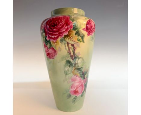 A beautiful green vase decorated with hand painted pink roses. Belleek Willets backstamp. Artist signed on the side. Dimensio