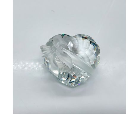 Part of the 'Exquisite Accents' theme group. A clear crystal heart decorated with a matt crystal ribbon. Swarovski marked. Th