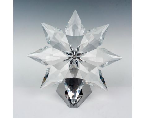 Exquisite lead crystal made with a light up mirror stand. This Christmas star is part of the Christmas Ornaments collection. 