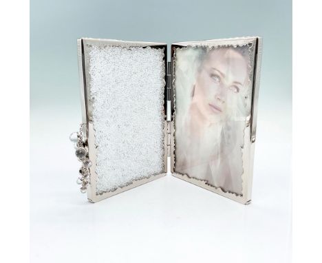 A beautiful hinged picture frame for two 4 x 6 photos. Clear crystal sparkling chatons with clear crystal beaded tassel. Swar