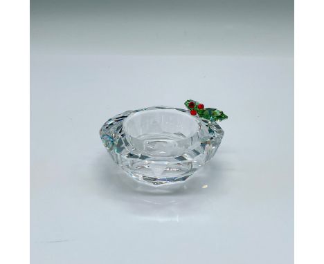 Part of the Christmas At Home theme group. A clear crystal candle holder decorated with peridot crystal leaves and Siam cryst