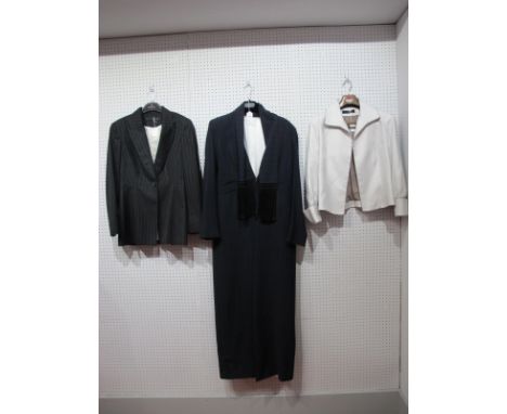 Amanda Wakeley London; An Ankle Length Navy Pinstripe Wool Crepe Coat, fitted, with fringed scarf detail to front and centre 