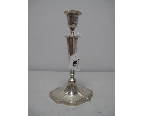 A Hallmarked Silver Candlestick, Walker &amp; Hall, Sheffield 1939, of tapering design, on shaped base with reeded detail, (b