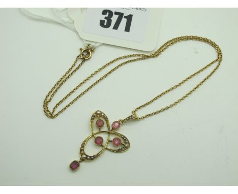 An Edwardian Style Openwork Seed Pearl Set Pendant, with collet set highlights, stamped "15ct", on fine chain.