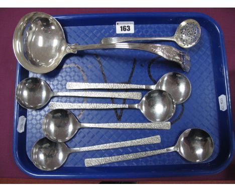 A Set of Six Viners Studio Soup Spoons, together with a King's pattern plated ladle and a decorative sifter spoon.