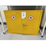 A steel double door inflammables storage cabinet 92cm x 47cm x 71cm h.