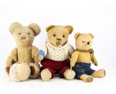 Three British teddy bears,  comprising of one sheepskin teddy bear, a Tinka-Bell  sheep skin ball and two worn teddy bears --