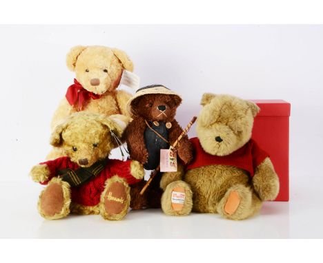 A Harrods 20th Anniversary hand puppet,  with  tag, a Gund Disney Fest Special Edition Classic Pooh, and two others 
