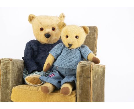 Two Chiltern  Post-war teddy bears,  both with orange and black  glass eyes, the larger with a black plastic nose, swivel hea