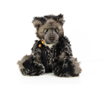 A Charlie Bears Oakley Teddy Bear, 2010, designed by  Isabell Lee black with white  tipped plush, with card tag --17½in (44cm