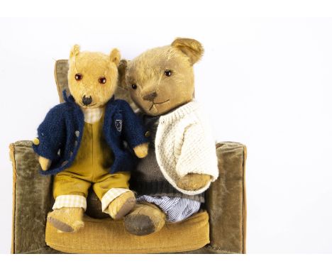 Two Chiltern Post-war teddy bears,  with orange and black eyes, swivel heads and jointed limbs --18½in (47cm.) high  (wear)  
