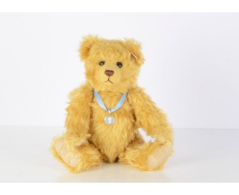 A Steiff limited edition  Golden Jubilee teddy bear,  produced exclusively for Guild of Glass &amp; China Retailers, wearing 