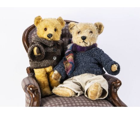 Two Post-war Chiltern Hugmee teddy bears,  with orange and black glass eyes, black plastic noses, swivel heads and  jointed l