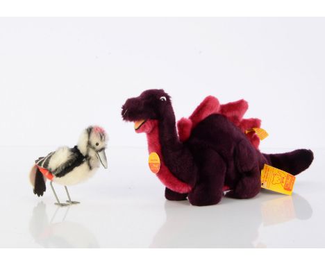 A Steiff yellow tagged Cosy Dino,  and a Steiff yellow tag Woodpecker 