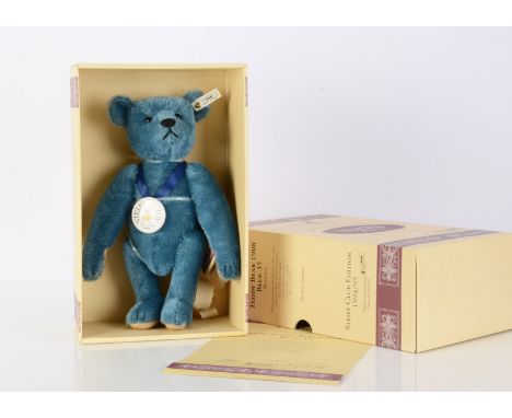 A Steiff Club Edition 1994 teddy bear 1908 replica blue,  8107 for the year, in original box with certificate --13in (33cm.) 