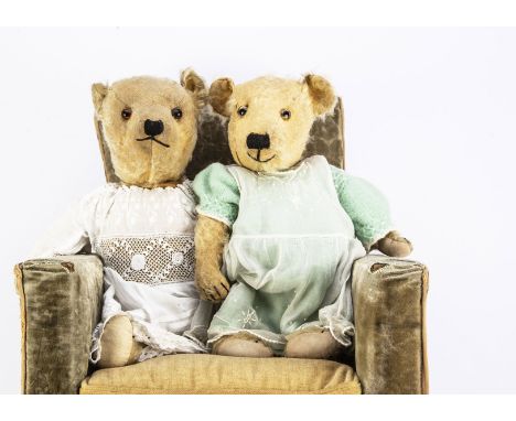 Two Chiltern-type teddy bears,  both with glass eyes, swivel heads and jointed limbs --20½in(52cm). high (one with repair to 