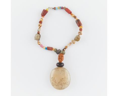 Chinese chalcedony or Agate belt buckle strung on a necklace of miscellaneous beads including two pre-Columbian Mezcal greens