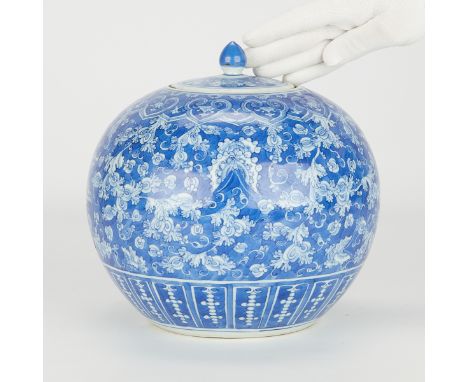 Chinese blue and white porcelain covered ginger jar, mid to late 18th century. Of globular form with profuse floral and folia