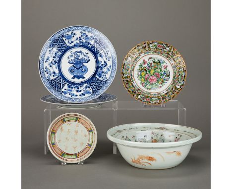 Group of five Chinese porcelain plates, basin, and saucer. Including:One Ming Swatow saucer with inscriptions along the top. 