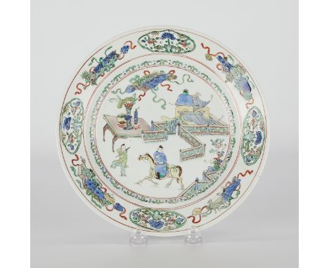 Chinese Kangxi 18th century famille verte porcelain plate. Decorated in the center with a scene of a figure riding a horse ou