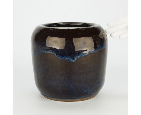 Japanese flambe blue glazed stoneware jardiniere.Height: 9 1/2 in x diameter: 9 in.Condition: No visible cracks, losses or ch
