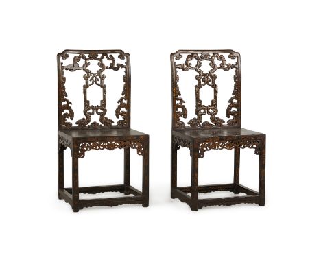 Nearly identical pair of Qing imperial Chinese lacquered Chippendale style chairs.Provenance: Yamanaka &amp; Co., "Art Treasu