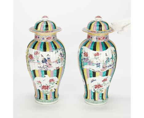 Pair of 18th century Chinese export baluster porcelain vases. With bold stripes of pink, green, yellow, and black. Each with 