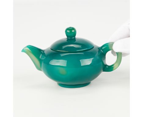 Chinese green chalcedony agate teapot. With a grape pattern throughout ranging from apple to dark green.Keywords: chrysoprase