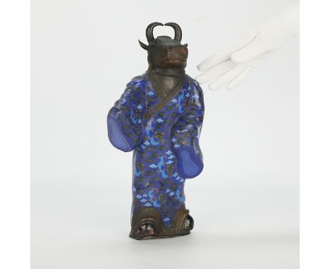 Large and unusual Chinese PRC cloisonne figure depicting an ox immortal in a flowing blue robe. The robe decorated with bats 