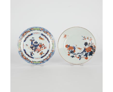 Two Chinese Imari porcelain plates, 18th century. One painted with precious objects surrounded by floral and latticework deco