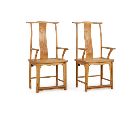 Pair of early 19th century Chinese yolk back hardwood armchairs with curved top rail extending beyond round stiles above sing