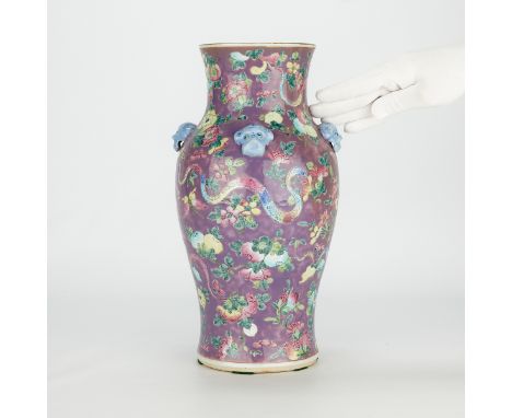 Chinese 19th c. Peranakan ware porcelain vase. With a purple ground with floral and foliate motifs interspersed with colorful